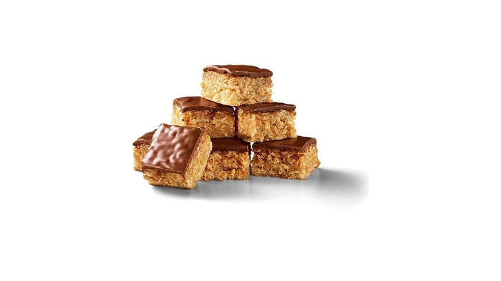 Peanut Butter Crispy Bites · Bars made with creamy peanut butter, blended with crisped rice and topped with mouthwatering chocolate icing, cut into bite-sized pieces.