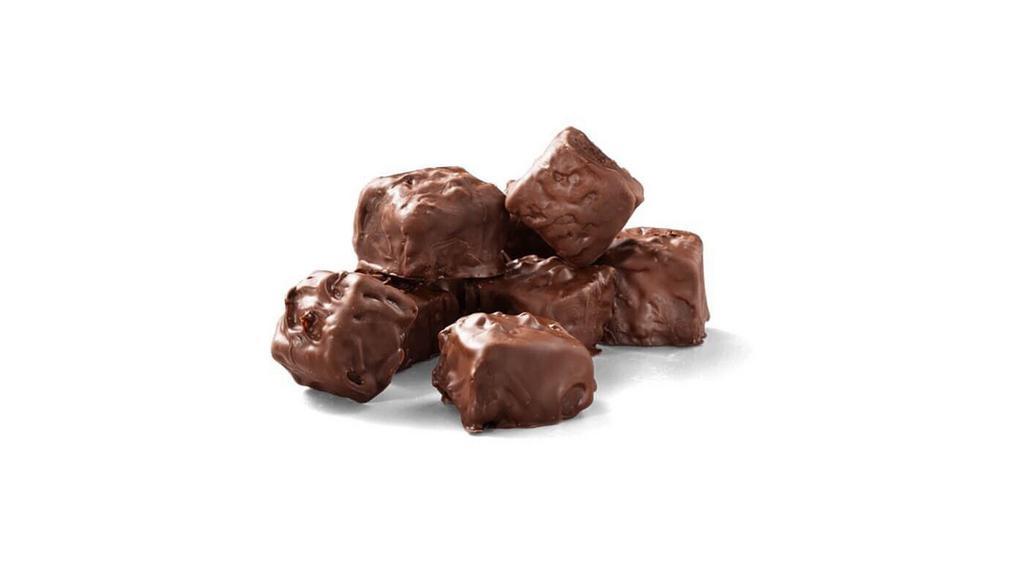Brownie Bites · Bite-sized chocolate brownies coated in a rich chocolate icing. This treat pairs perfectly with a slice of pizza.