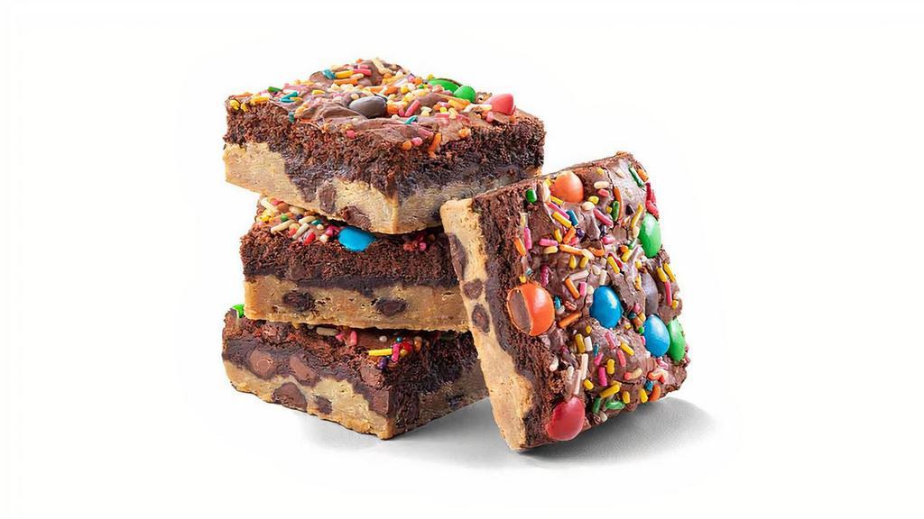 Shareable Party Brookie 4Pk · Golden chocolate chip cookie on the bottom with traditional fudge brownie on top. Finished with rainbow sprinkles and made with real M&M’S®. Four Brookies per pack makes this perfect for sharing! 220 calories per serving, 2 servings per piece, 4 pieces per order