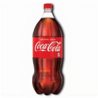 Coca-Cola 2L · Delicious and refreshing Coca-Cola pairs perfectly with your favorite pizza! Order your Coca...