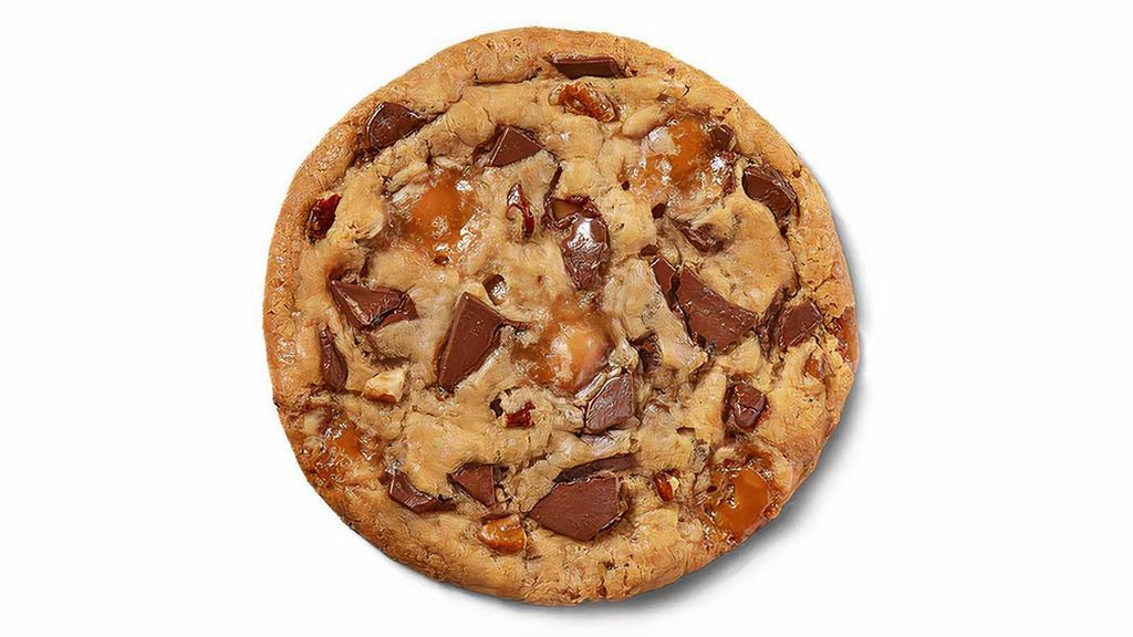 Caramel Chocolate Pecan Cookie · With so many delicious flavors packed into this cookie, it's one you have to try! If ordering more than 2 Dozen cookies, please order 24 hours in advance.