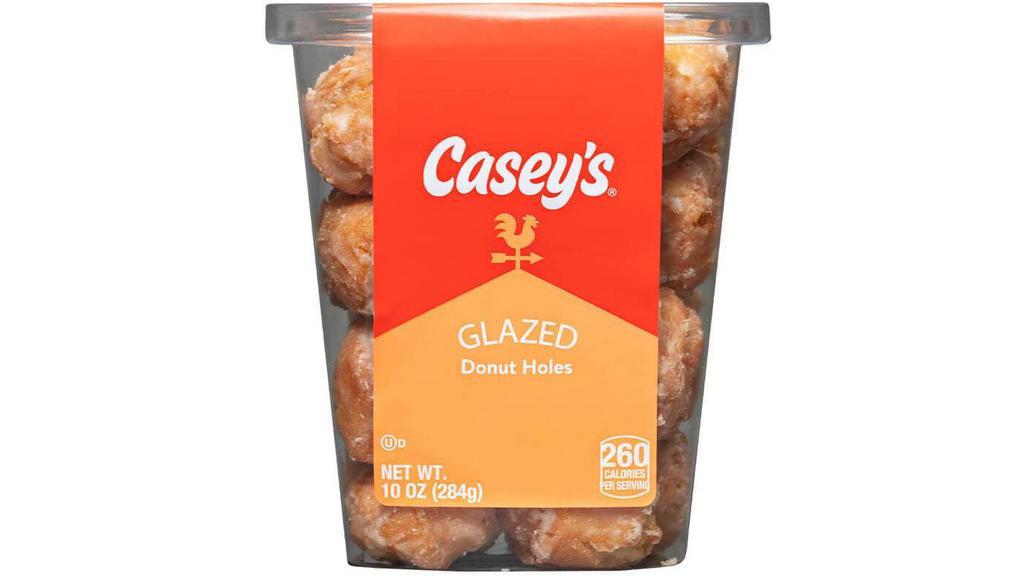 Casey'S Glazed Donut Holes 10Oz · Casey's Glazed Donut Holes are the best way to eat a donut when you're on-the-go. Soft, bite-size donut holes coated in a delicious glaze. Order your Glazed Donut Holes for delivery or pickup!