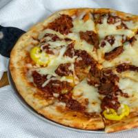 Mississippi Bbq Pizza · Traditional Southern Pulled Pork served with our Signature BBQ Sauce, Cheddar & Mozzarella C...