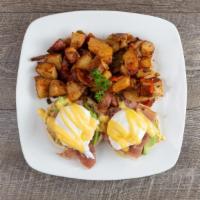 P + B Benedict · House Signature. 380 Calories. Two halves of English muffins topped with a poach eggs prosci...
