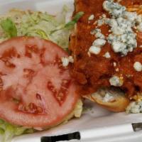 Buffalo Chicken
 · Grilled or beer battered chicken tossed in buffalo sauce. bleu cheese, lettuce and tomato.