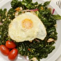 Kale (Gluten-Free) · Kale, toasted almonds, golden raisins, feta, quinoa topped with an egg cooked to your liking...