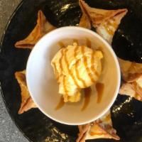Cheesecake Rangoons (5 Pieces) · Cheesecake filled rangoons served with ice cream.