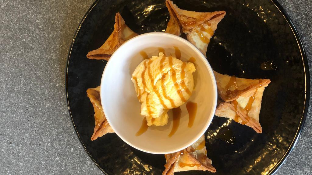 Cheesecake Rangoons (5 Pieces) · Cheesecake filled rangoons served with ice cream.
