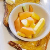 Healthy French Toast · Whole grain bread dipped in egg white batter and grilled golden brown. Served with fresh fru...