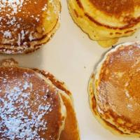 Silver Dollar Pancakes · 10 mini buttermilk pancakes dusted with powdered sugar.