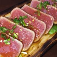 Tuna Tataki · Seared tuna with ponzu sauce.