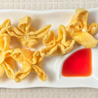 Crab Rangoon · 8 pieces. fried wonton wrapper filled with crab and cream cheese.