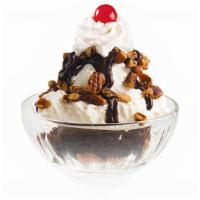 Fudge Brownie Sundae · 1500-1800 cal. Warm brownie, vanilla ice cream, hot fudge, pecans, whip and a cherry.