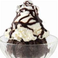 Lava Cake Sundae · Warm lava cake with vanilla ice cream and chocolate drizzle.