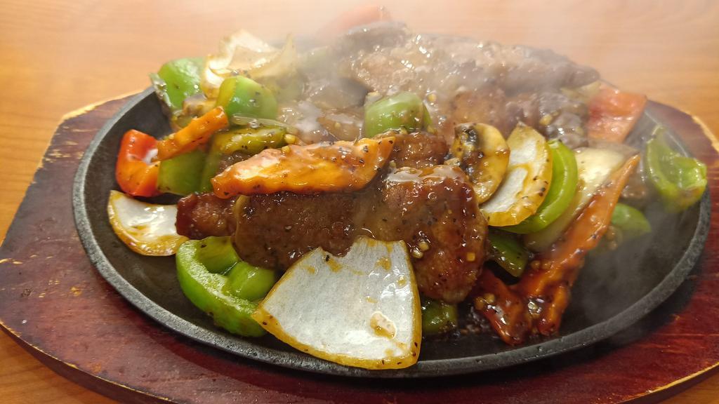 Black Pepper Steak · Steak, bell pepper, carrot, onion with black pepper sauce.