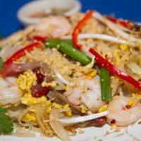 Red Ginger Pad Thai · Wok-tossed thai rice noodles with chicken, pork, beef, shrimp, egg, bean sprout, scallions a...
