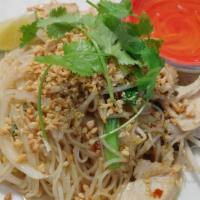 Chicken Pad Thai · Wok-tossed thai rice noodles with chicken, egg, bean sprout, scallions and onion, fish sauce...