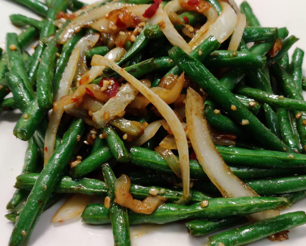 Szechwan Green Bean · Green bean green bean tossed with ginger, garlic, onion and preserved vegetable in a spicy Szechwan sauce.
