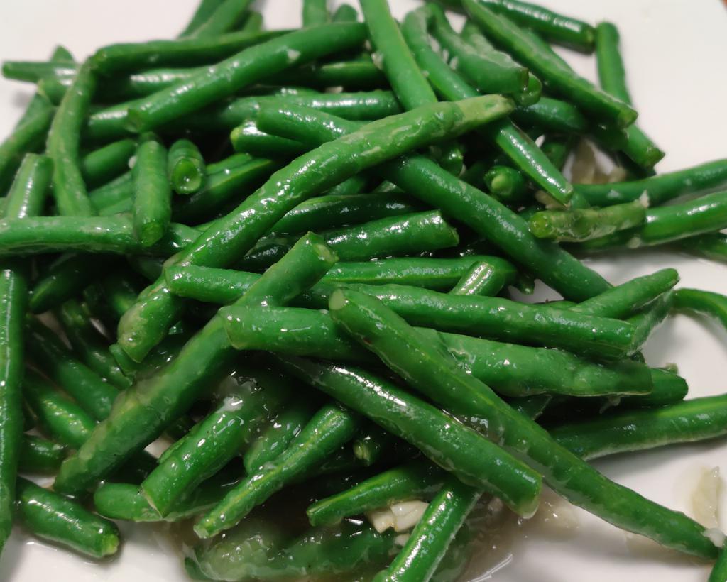Green Bean In Garlic Sauce · Stir-fried green bean with onion and garlic.