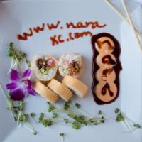 Nara 101 · Crabmeat, Avocado, Cucumber topped with White Tuna, baked in Spicy Mayo, Wasabi Aioli