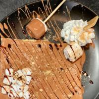 Perfect Match Crepe · Melted chocolate, crumbled graham crackers, marshmallows, and whipped cream.