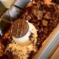 Oreo'S Crepe · Melted white chocolate, oreo crumbs, ice cream, and melted chocolate.