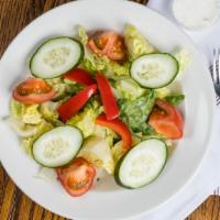 Dinner Salad · Fresh Iceberg and Romain lettuce with fresh cucumbers and tomatoes