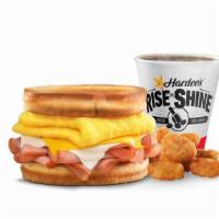 Frisco Breakfast Sandwich®  Combo · Thinly sliced ham, folded egg,  American & Swiss cheeses on sourdough toast. Served with Has...