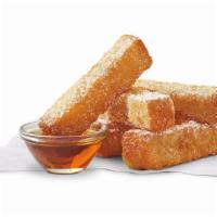 French Toast Dips® · 5-piece French Toast Sticks, sweetly sprinkled with powdered sugar, served with a side of sy...