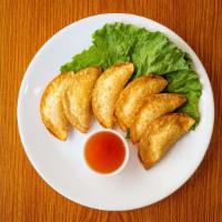 Cream Cheese Wontons · Six piece, comes with sweet & sour sauce.