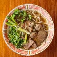Phở Đặc Biệt (Combo) · Sliced beef, beef meatball, and beef brisket
