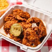 Wings (5) · 5 whole wings served with a slice of white bread + pickles. Select heat level for each of yo...