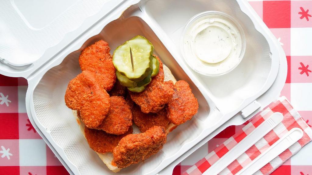 Nuggs® · 10 plant-based nuggets served with our housemade vegan Ranch. Add sides a la carte to make it a meal.