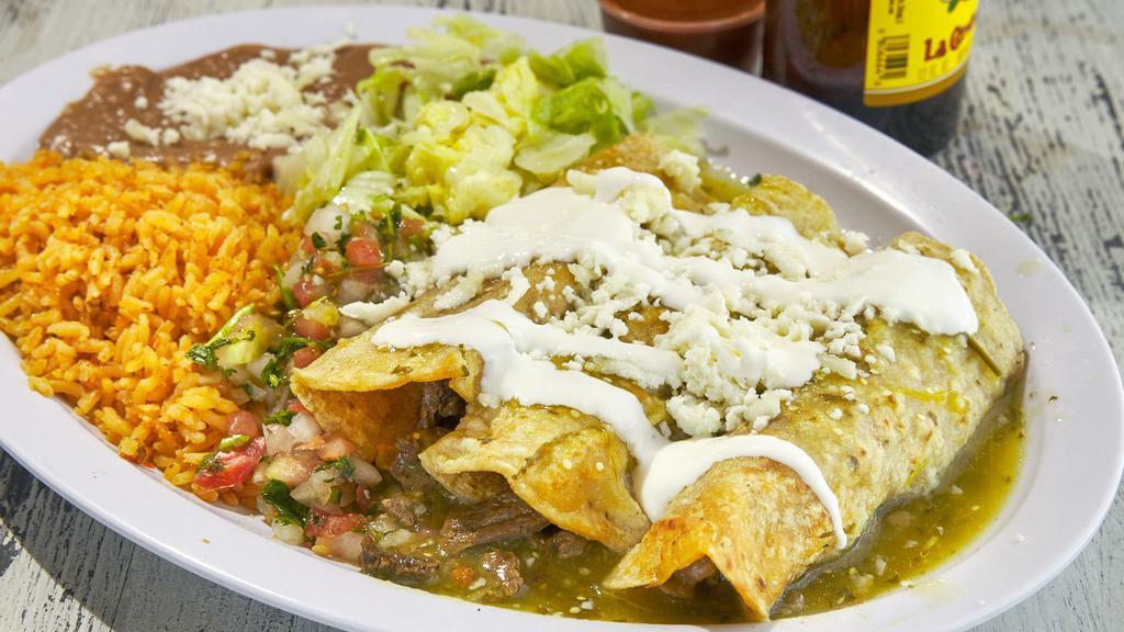 3 Pieces Enchiladas · Our enchiladas are topped with red or green sauce, sour cream and queso fresco served with rice, beans, lettuce & pico de gallo.