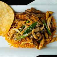 Seni'S Favorite · Steak and chicken grilled with onions tomatoes and jalapenos, rice and melted queso on top, ...