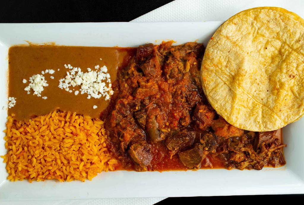 Carnitas Platter · Delicious carnitas mixed with your favorite salsa verde or salsa roja, served with rice and beans.
