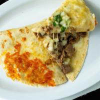 Ground Beef Quesadilla · Flour tortilla with shredded cheese, ground beef inside, side of lettuce, pico de gallo & so...