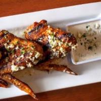 Crave Wings^ · Jumbo wings marinated overnight, grilled and fried until crispy, then tossed in your choice ...