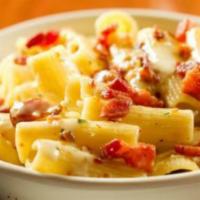 Baked Mac & Cheese · blend of cheeses melted into our cream sauce tossed with bacon & cavatappi then topped with ...