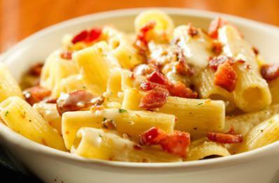 Baked Mac & Cheese · Blend of cheeses melted into our cream sauce tossed with bacon ad cavatappi then topped with bread crumbs and more bacon.