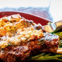 Bone-In Ribeye · Certified Angus Beef bone-in ribeye grilled 
with a blend of seasoning, topped with roasted ...