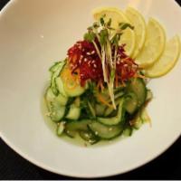 Sunomono Salad · fresh cucumbers, daikon, carrots, sweet rice vinegar.