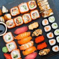 Party Tray 4 - (12 Sushi , 12 Sashimi, 8 Rolls) · Spicy. 12 pcs sushi, 12 pcs sashimi, rolls of 2 California, 1 spicy tuna, 1 shrimp tempura c...