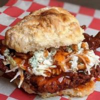 The Heater · Hot Chicken topped with coleslaw, blue cheese and habanero BBQ sauce.