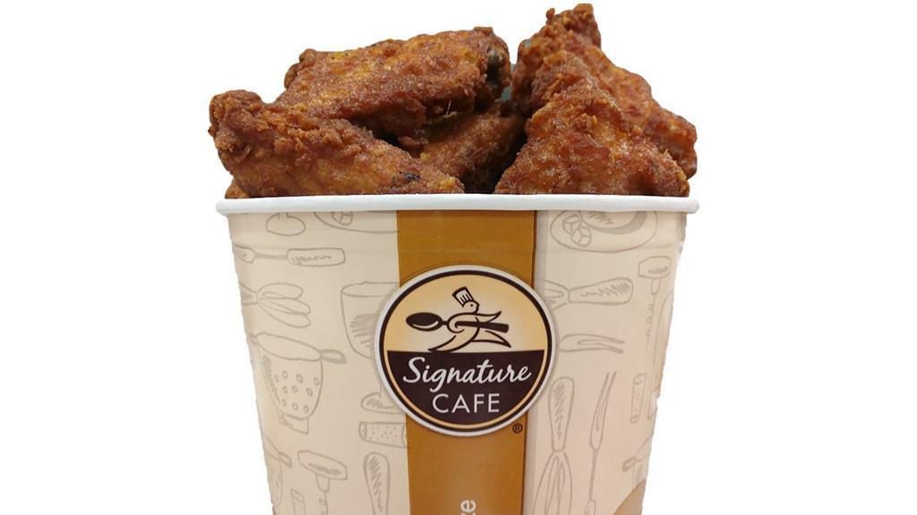 Combo Wing Bucket (2.5 Lbs) · Combination wing bucket with honey and hot & spicy wings.