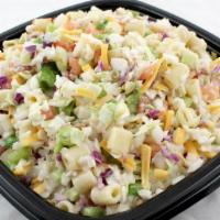Chopped Salad · Chopped cabbage, green onions, green peppers, bacon, pasta, cheddar cheese and our famous al...