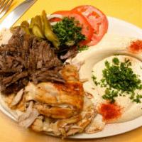 Shawarma Combo · With one of your choice of hummus baba ganoush rice or fries.
