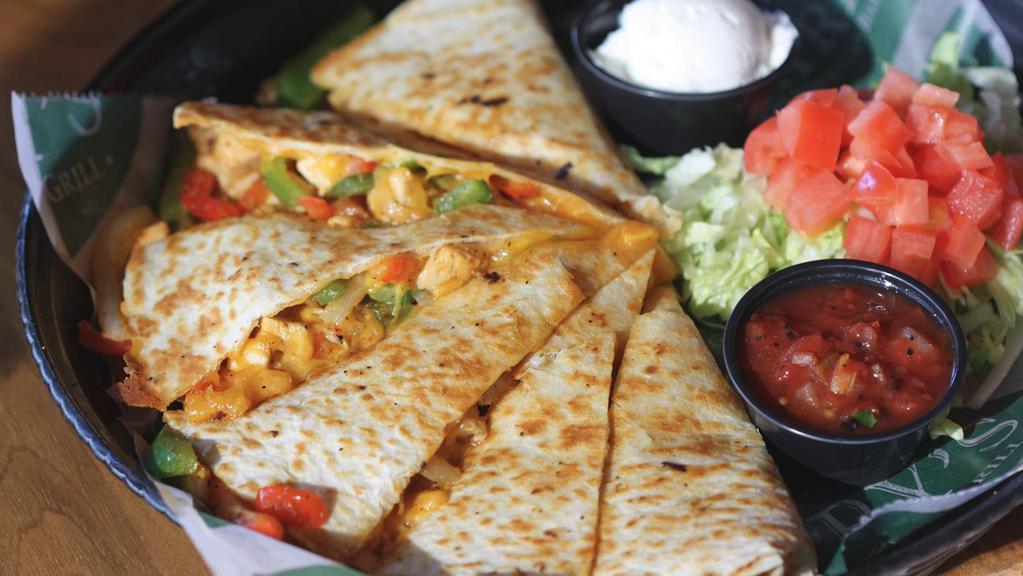 Chicken Quesadilla · Warm tortilla filled with onion, green peppers, chicken and cheddar cheese. Served with sour cream and salsa.