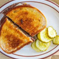 Patty Melt -O · Grilled With Swiss, Am Cheese, Onion