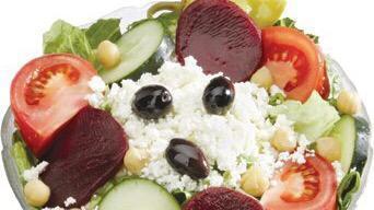 Leo'S Famous Greek Salad Mini · Iceberg lettuce, tomato, cucumber slices, pepperoncini, greek olives, beets, chickpeas, feta...